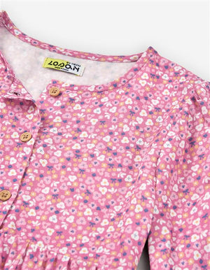 🌷 Blusa rosa com flores e botões – menina (2 aos 7 anos)