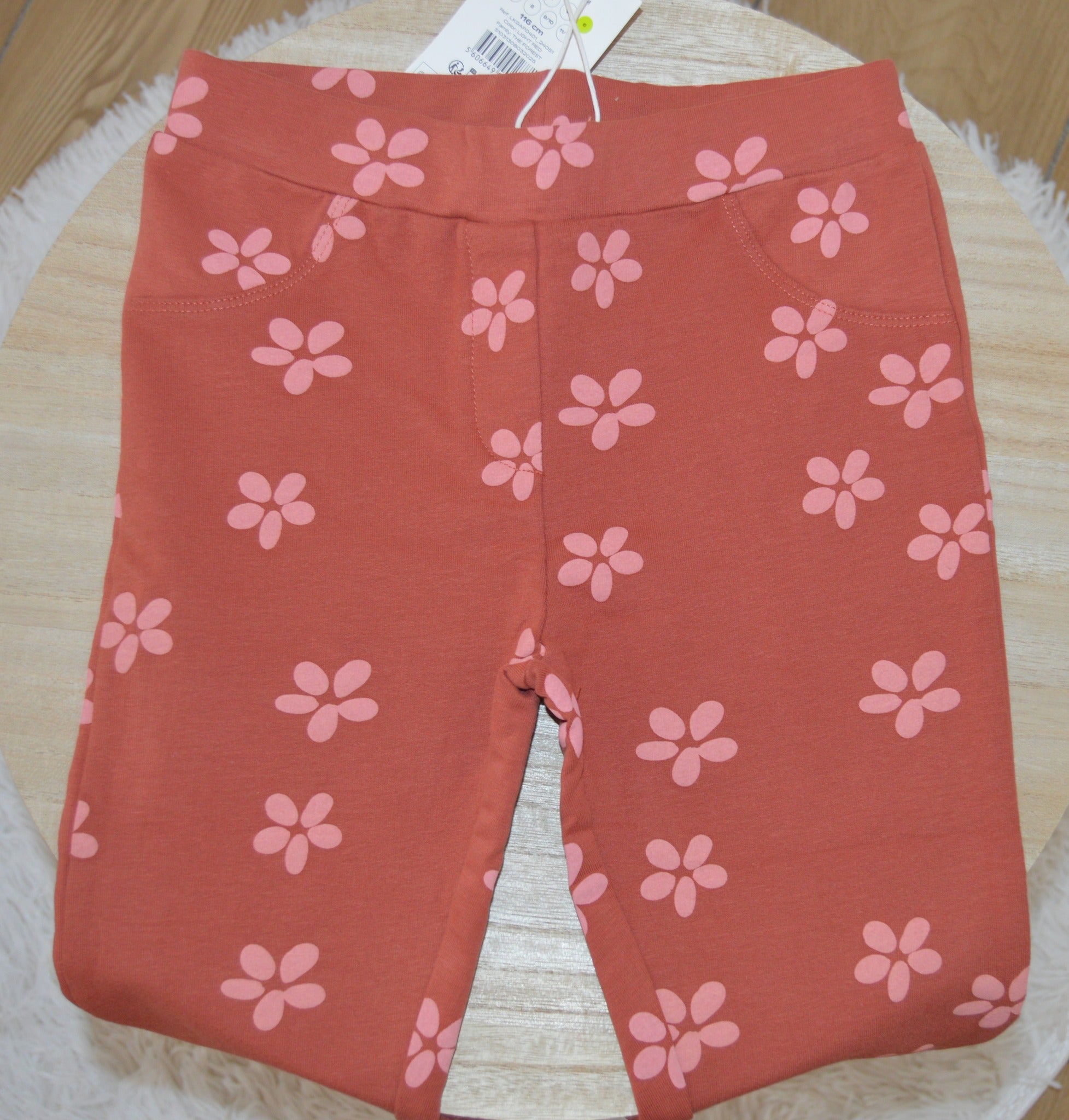 Legging cor de tijolo com flores